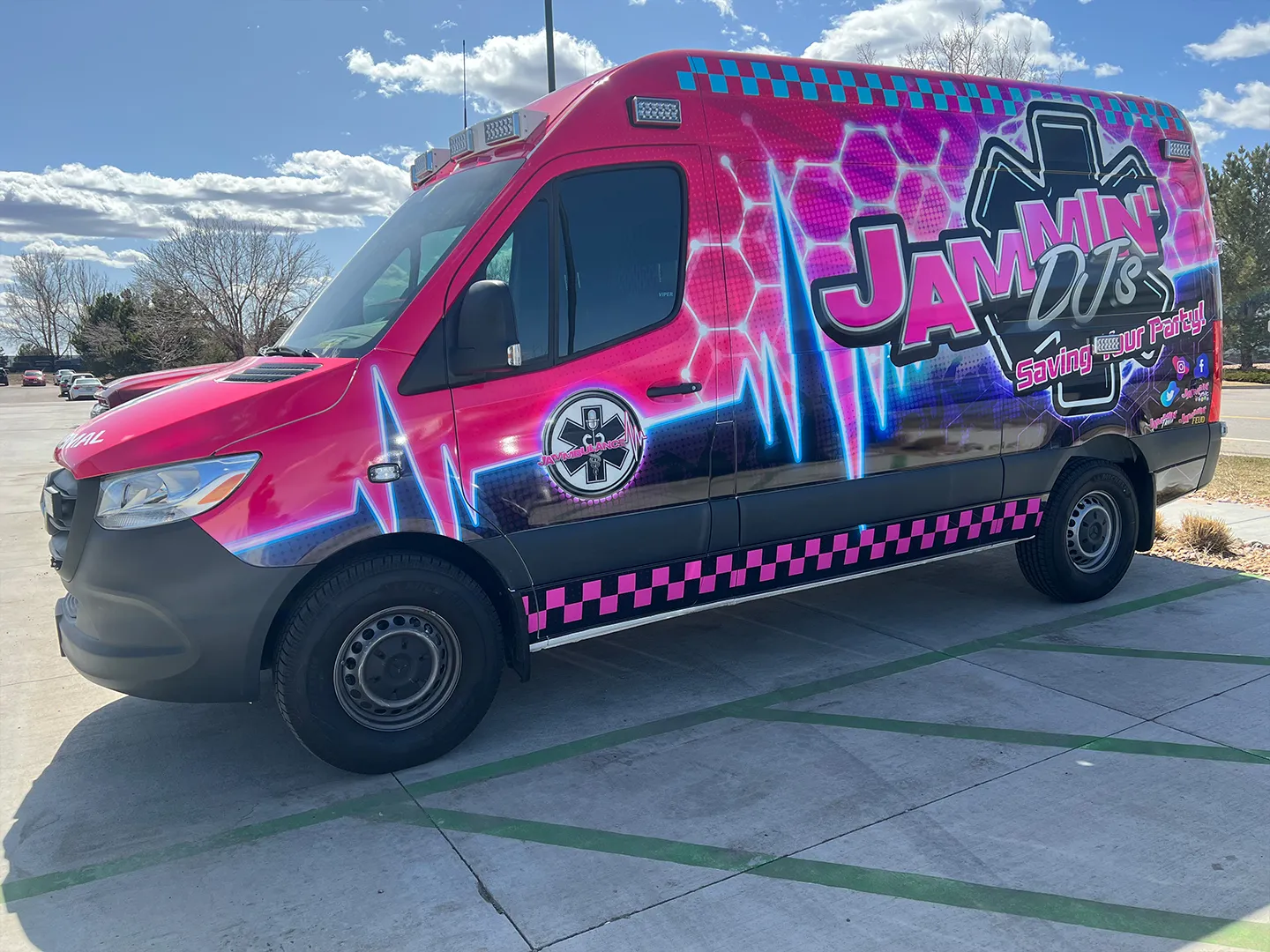 black van with personalized pink branded decals